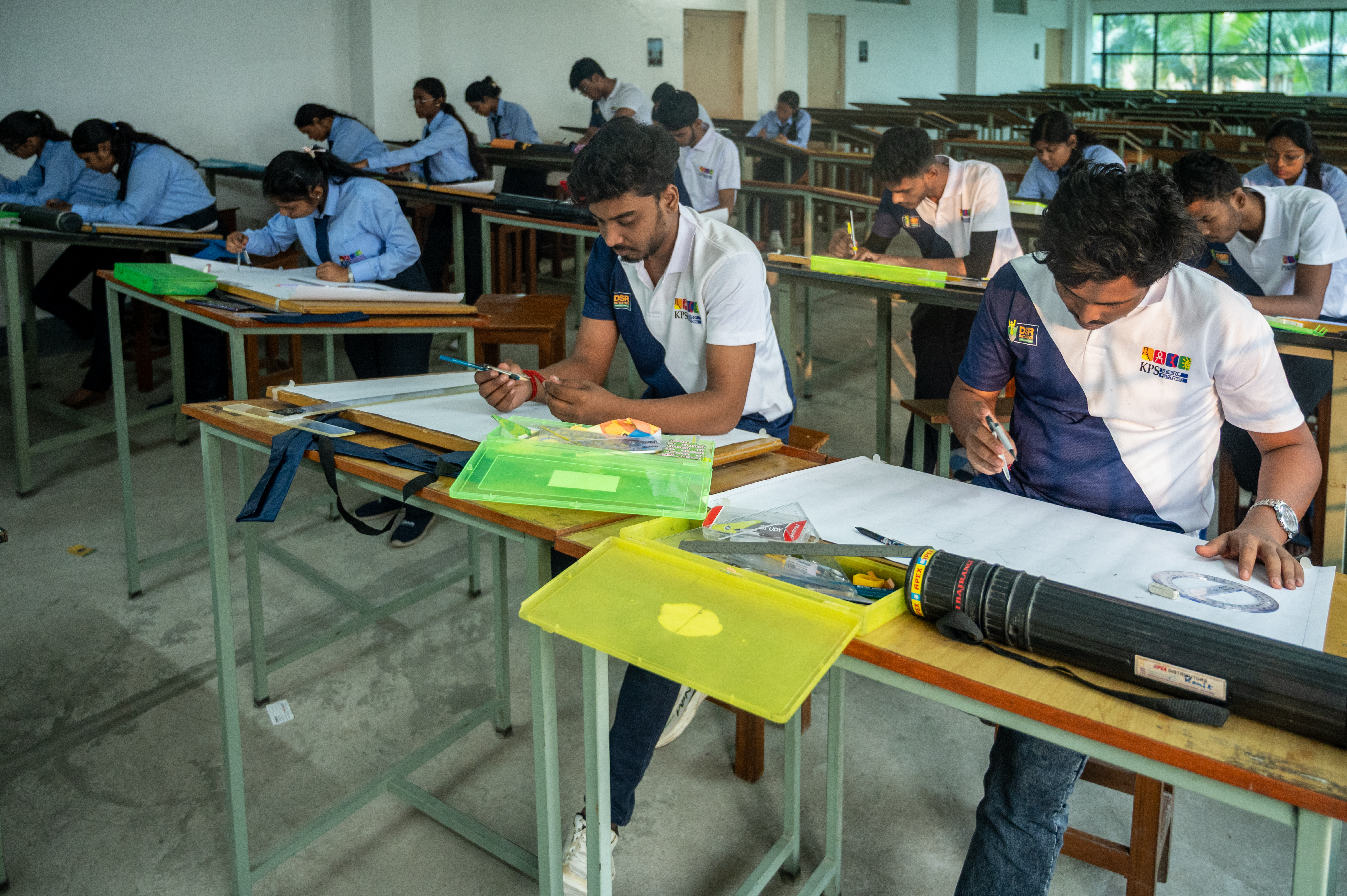 Students completing civil engineering drawing work